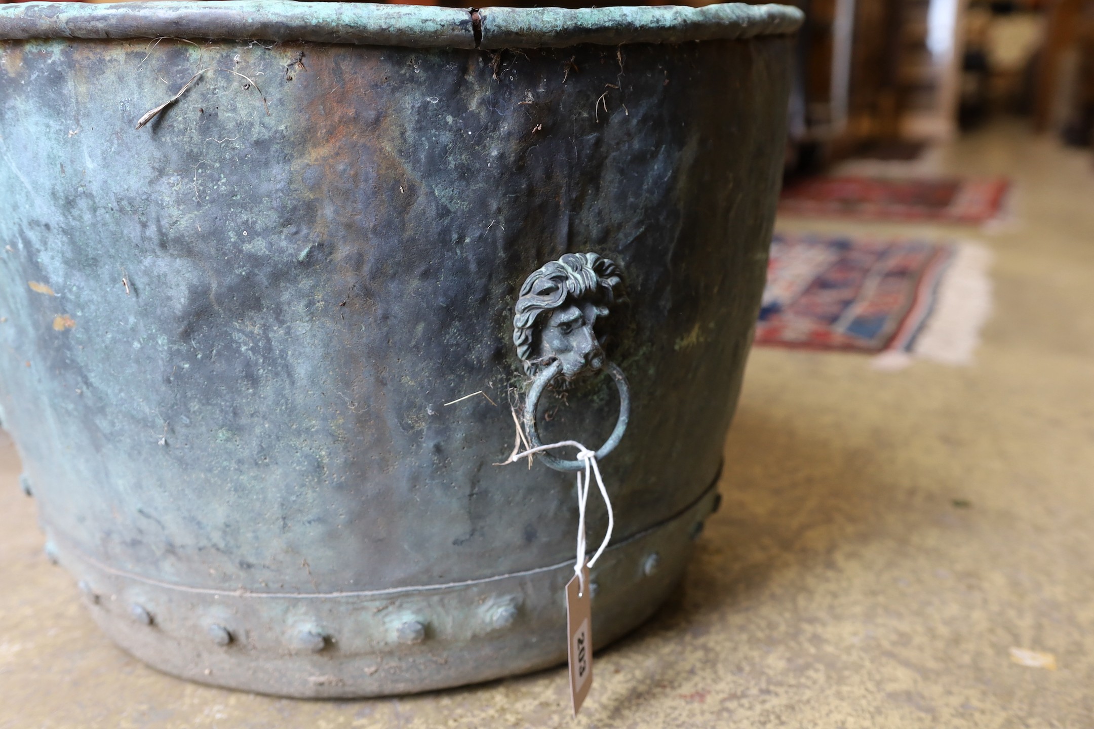 A Victorian copper copper with lion ring mask handles, diameter 52cm, height 36cm